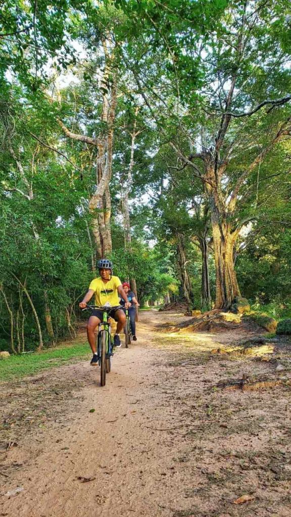 Cycling on the walls of Angkor Thom