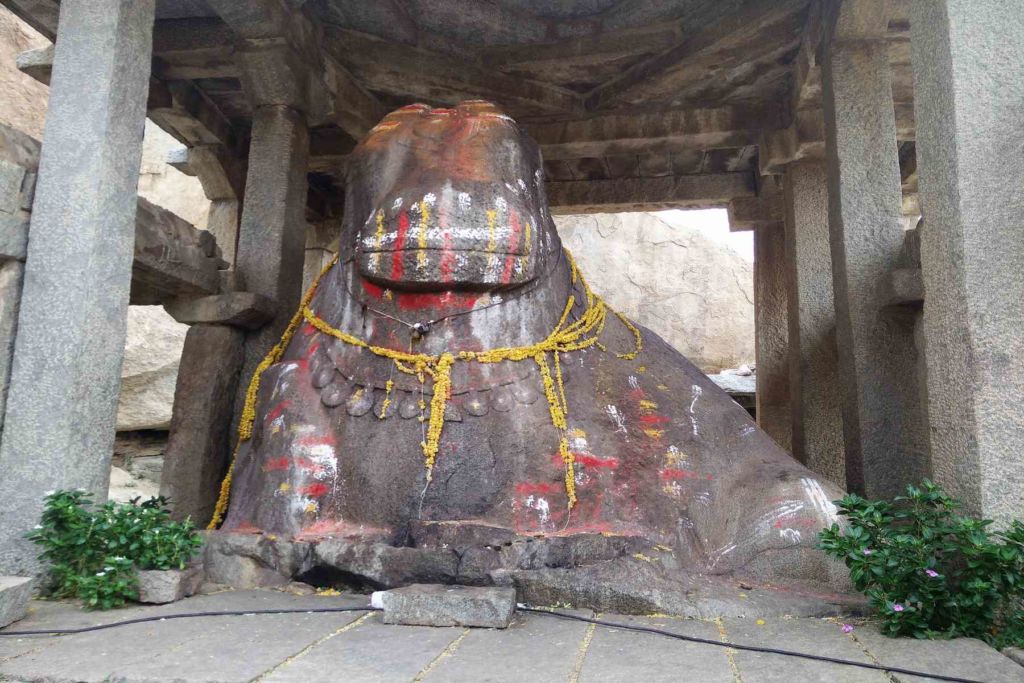 Monolithic Nandi in Hampi facing the only functioning temple 'Virupaksha' 