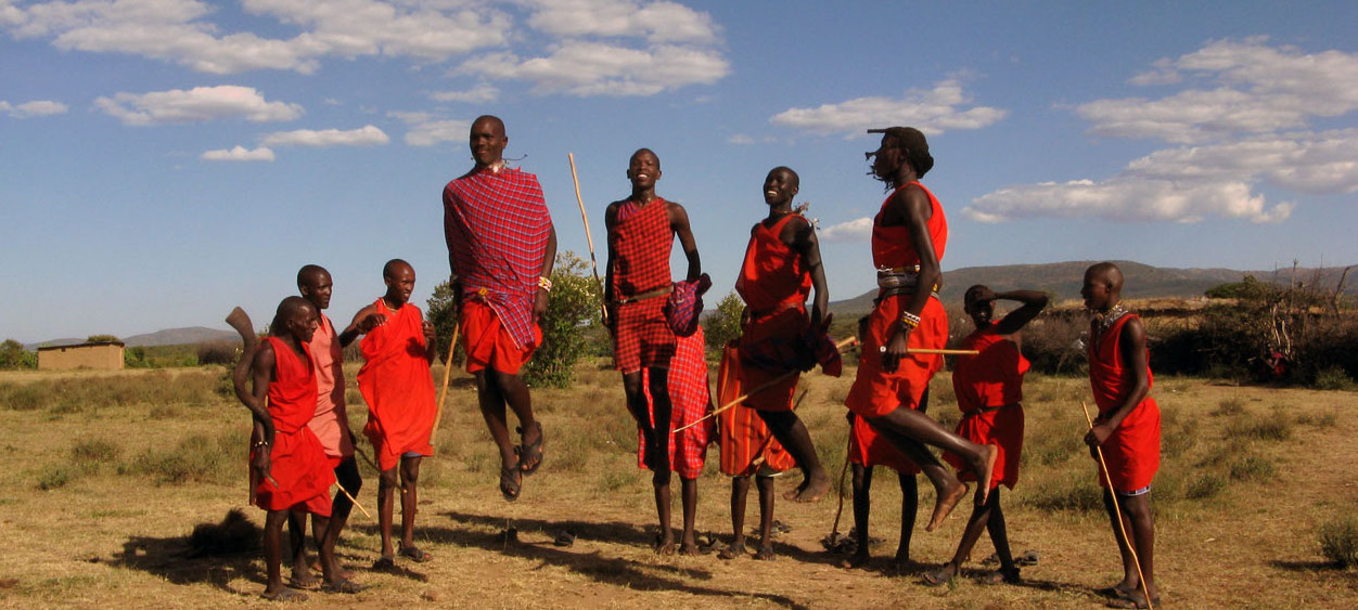 Africa, Kenya, Maasai Mara. A colorful display of fabrics and